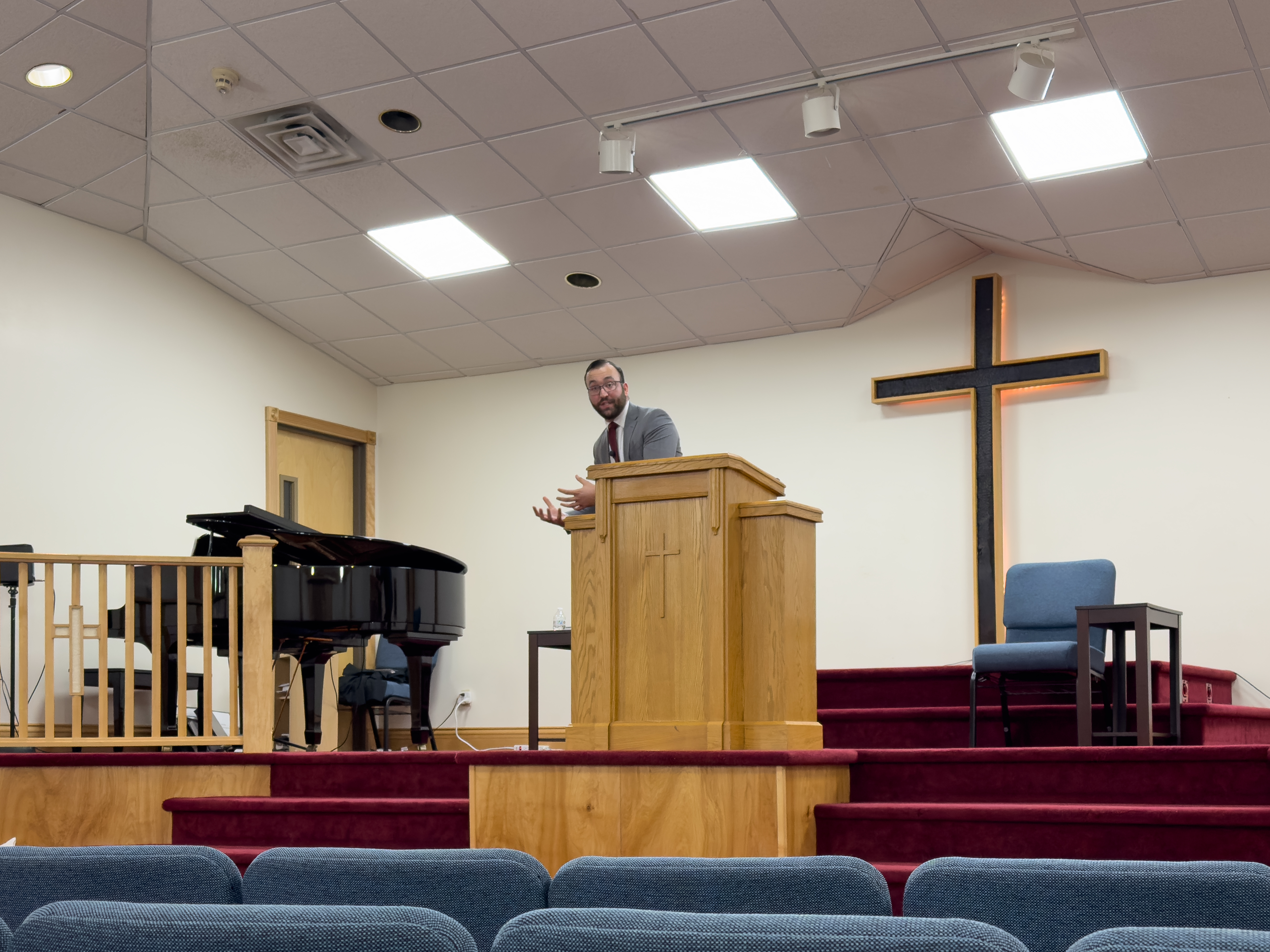Pastor Josh Calabrese preaching at Blessed Hope Baptist Church